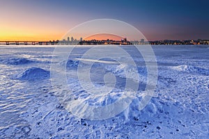 Beautiful winter landscape with frozen river at Dusk III