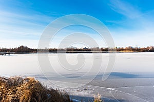 Beautiful winter landscape of ice-covered river