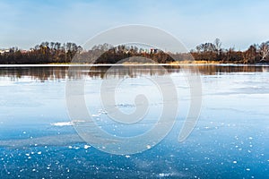 Beautiful winter landscape of ice-covered river