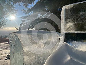 Beautiful winter landscape with ice, sun and snowdrifts