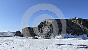 A beautiful winter landscape with majestic cliffs, mountains and hills
