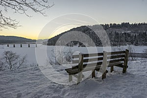 Beautiful winter landscape on Oker Dam in Harz in the frosty evening.