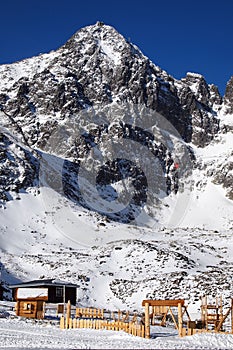 Beautiful winter landscape in Slovakia. Snowy High Tatras on a sunny day. Ski resort Tatranska Lomnica