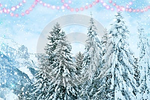 Beautiful winter landscape, snow-covered fluffy fir trees, snowfall in the mountains, panorama of mountain peaks, the Swiss Alps