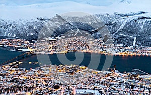 Beautiful winter landscape of snow covered town Tromso in Norway