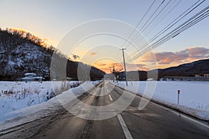 Beautiful Winter Landscape with Winter forest under the snow , powder snow on a road