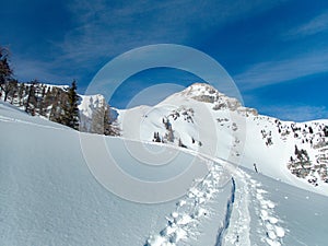 Beautiful winter lanscape skitouring in the alps