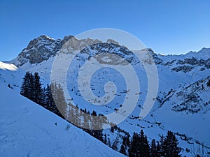 Beautiful winter mountain panorama above Partnun with a view of the Sulzfluh,Wiss Patte and Schijenflue mountains. Skimo