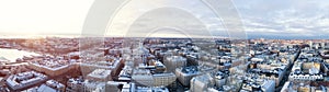 Beautiful winter panorama of the Old Town in Helsinki. Cathedral at sunset in Helsinki, Finland. Snow on the roofs.