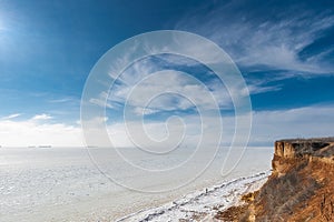 Beautiful winter seascape. Black Sea is covered with ice.