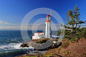 Vancouver Island, British Columbia, Canada - Historic Sheringham Point Lighthouse on Juan de Fuca Strait photo