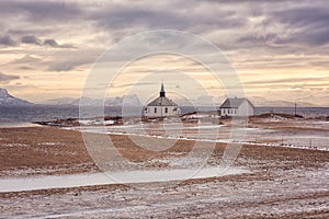 Beautiful winter sunset landscape, lonely church on the seacoast, Lofoten Islands, Norway