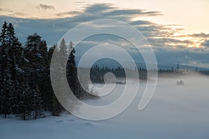 Beautiful winter sunset landscape with mountains. Altai