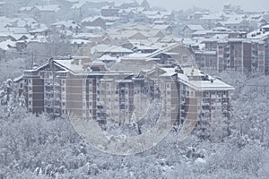 Beautiful winter view of houses and buildings with roofs covered with heavy snow. In snowy season, roof with lot snow.