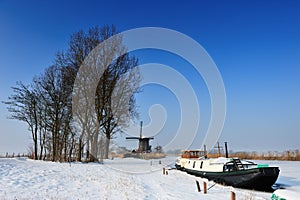 Beautiful winter windmill landscape