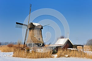 Beautiful winter windmill landscape