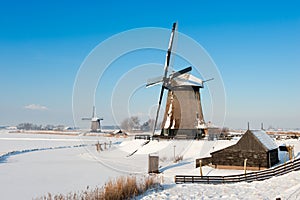 Beautiful winter windmill landscape