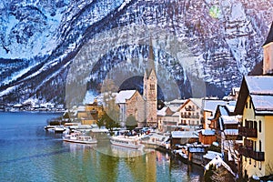 Beautiful winterlandscape of Hallstatt mountain village with Hallstatter lake in Austrian Alps