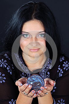 Beautiful witch with magic sphere