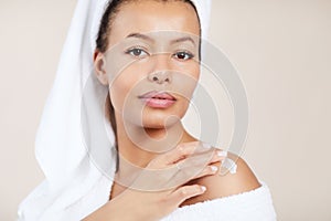 Beautiful Woman Applying Body Cream
