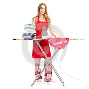 Beautiful woman in apron stack clean clothes ironing board iron