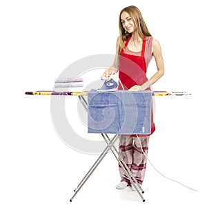 Beautiful woman in apron stack towels clean ironing board iron