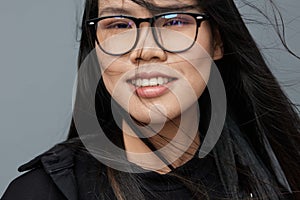 Beautiful woman asian studio fashion background portrait student cute business glasses smile