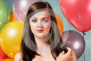 Beautiful woman with balloons