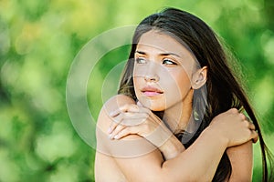 Beautiful woman with bare shoulders