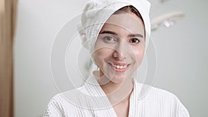Beautiful woman in a beauty clinic is standing smiling