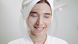 Beautiful woman in a beauty clinic is standing smiling