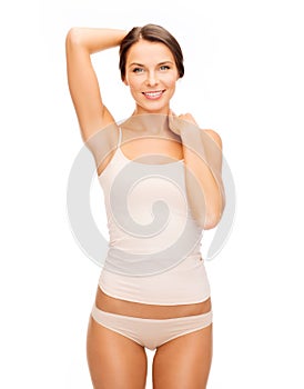 Beautiful woman in beige cotton underwear