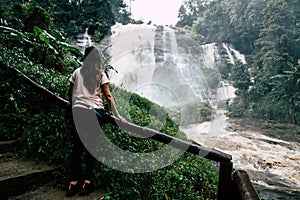 Beautiful woman at big waterfall after hiking in Chiang Mai & x28;Thailand
