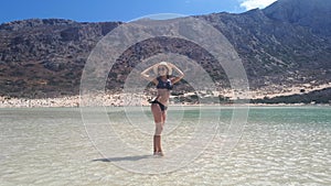 Beautiful woman in bikini on the Balos beach. Crete, Greece