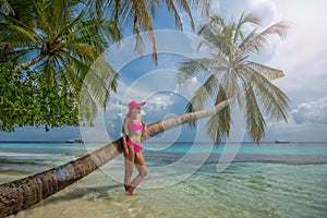 Beautiful woman in bikini on the Paradise island. Beach holiday