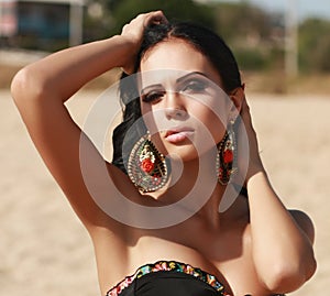Beautiful woman in bikini on summer beach