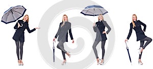 The beautiful woman in black coat with an umbrella