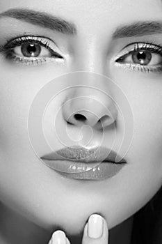 Beautiful woman blonde hair portrait close up studio black and white