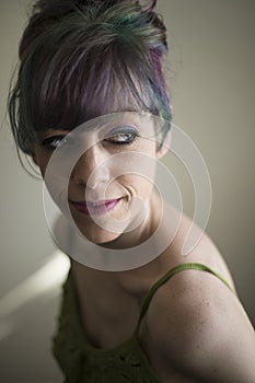 Beautiful Woman with Blue Eyes and Colorful Hair