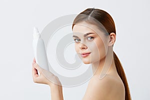 beautiful woman body lotion rejuvenation cosmetics light background