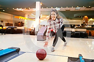 Beautiful woman bowling