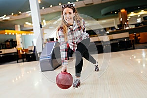 Beautiful woman bowling
