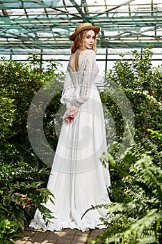 Beautiful woman bride fashion model blond hair bright makeup pretty wear long silk white dress lace bridal ceremony wedding