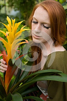 Beautiful Woman With Bromeliad