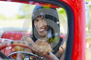Beautiful woman in cabriolet car