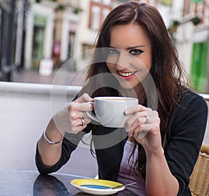 Beautiful woman at cafe