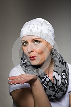 Beautiful woman cancer patient wearing headscarf