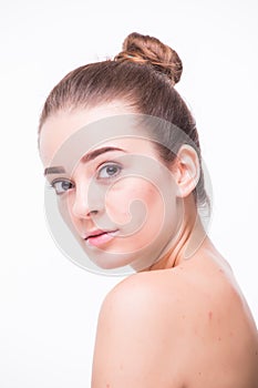 Beautiful woman cares for the skin neck- posing at studio isolated