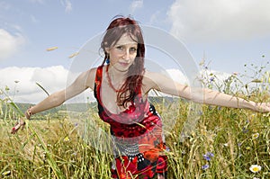 Beautiful woman cereal field summer