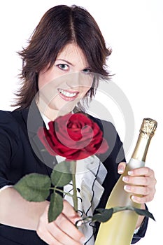 Beautiful woman with champagne and rose